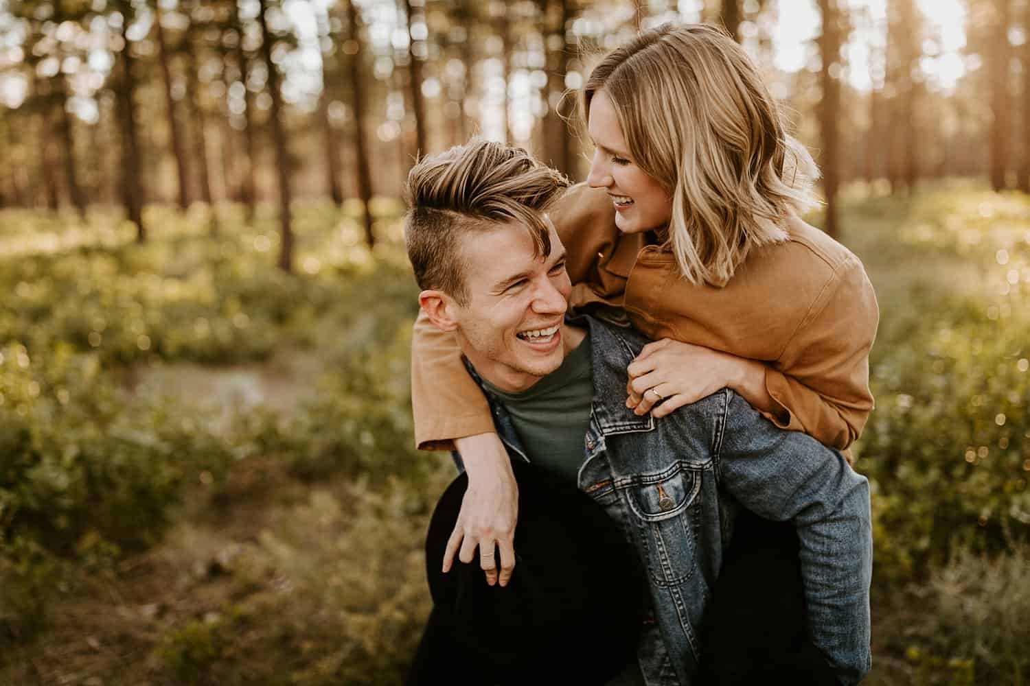 Engaged couple in high desert forest in Central Oregon