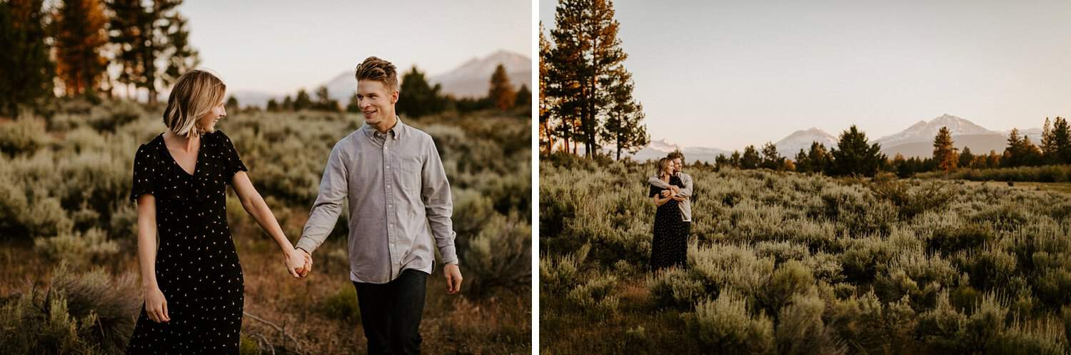 Engaged couple in meadow in Central Oregon with a mountain view